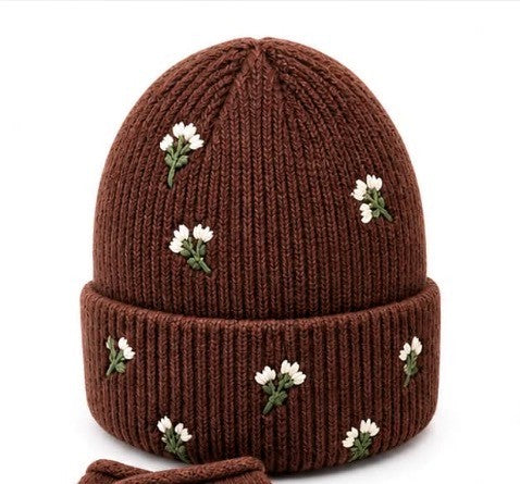Hat, strik m. blomster