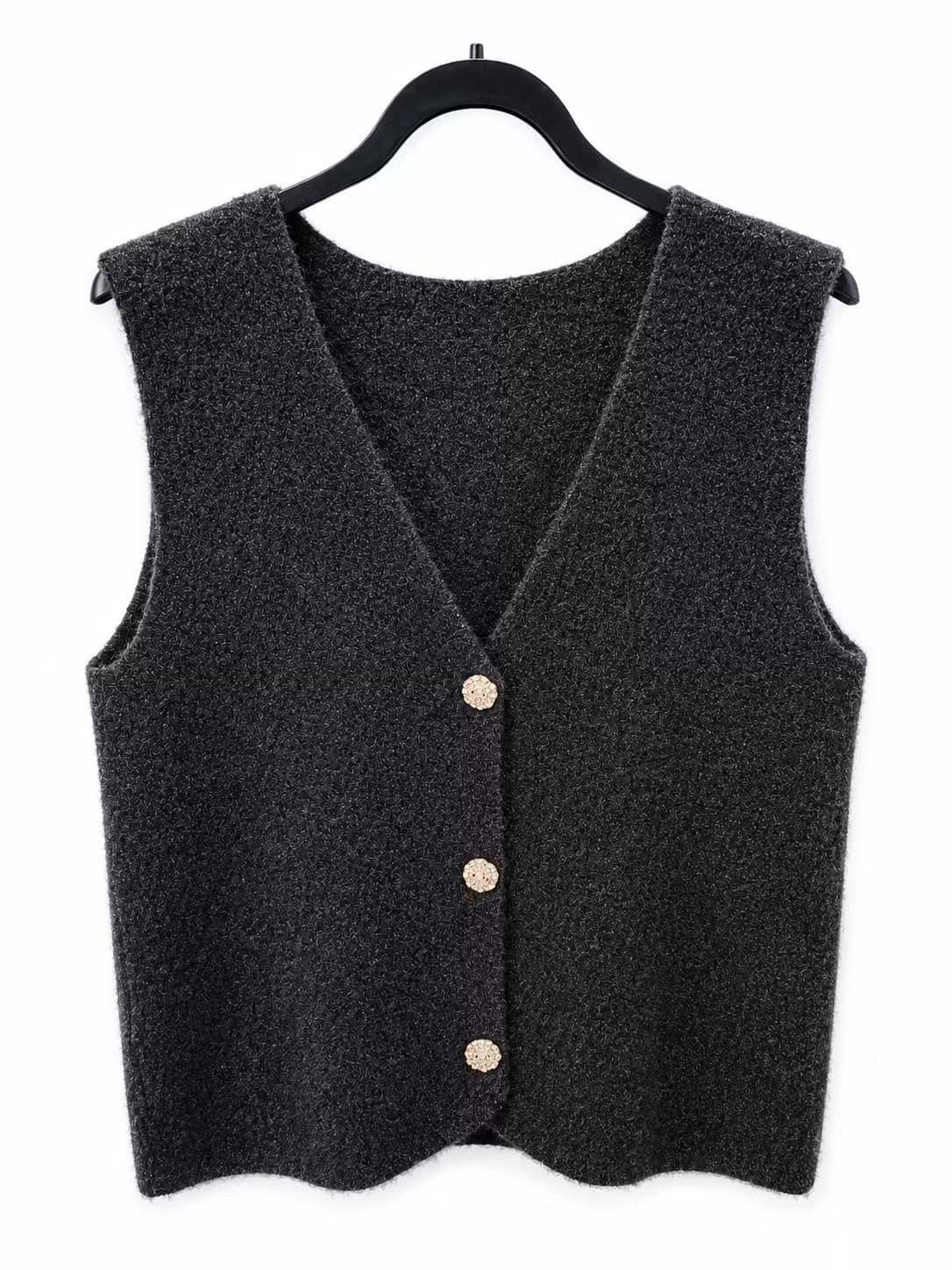 Vest m. guld knapper